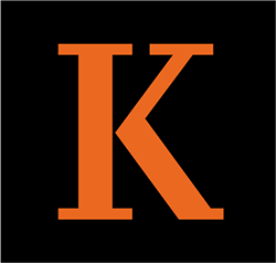 An orange K with a black outline on a black background
